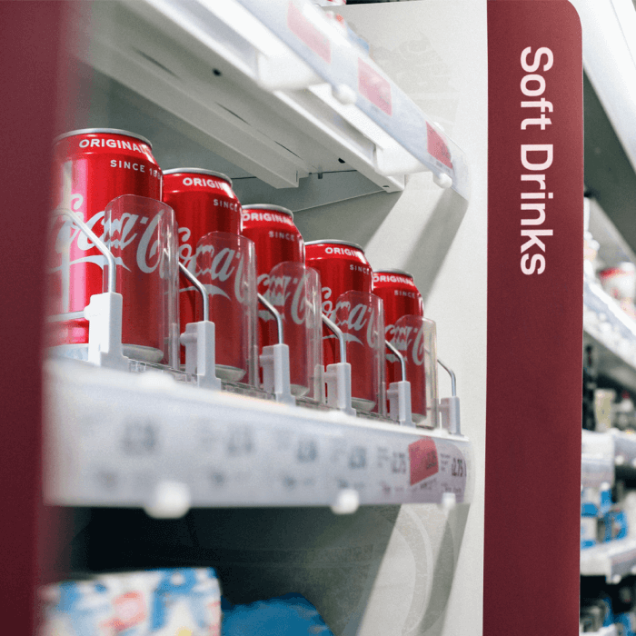 Spring Loaded Slow Feed Shelf Pusher System